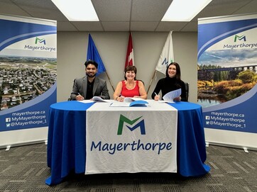 Rahul Anand , President ACON Ventures Inc , Mayor Janet Jabush and Emma Hubert , Corporate Executive ACON Ventures Inc. signing the land purchase agreement.